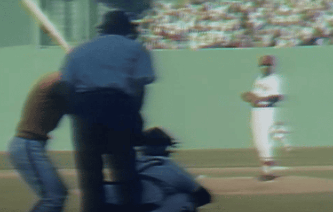 Image of Luis Tiant showcasing his pitching style, representing a forgotten baseball legend.